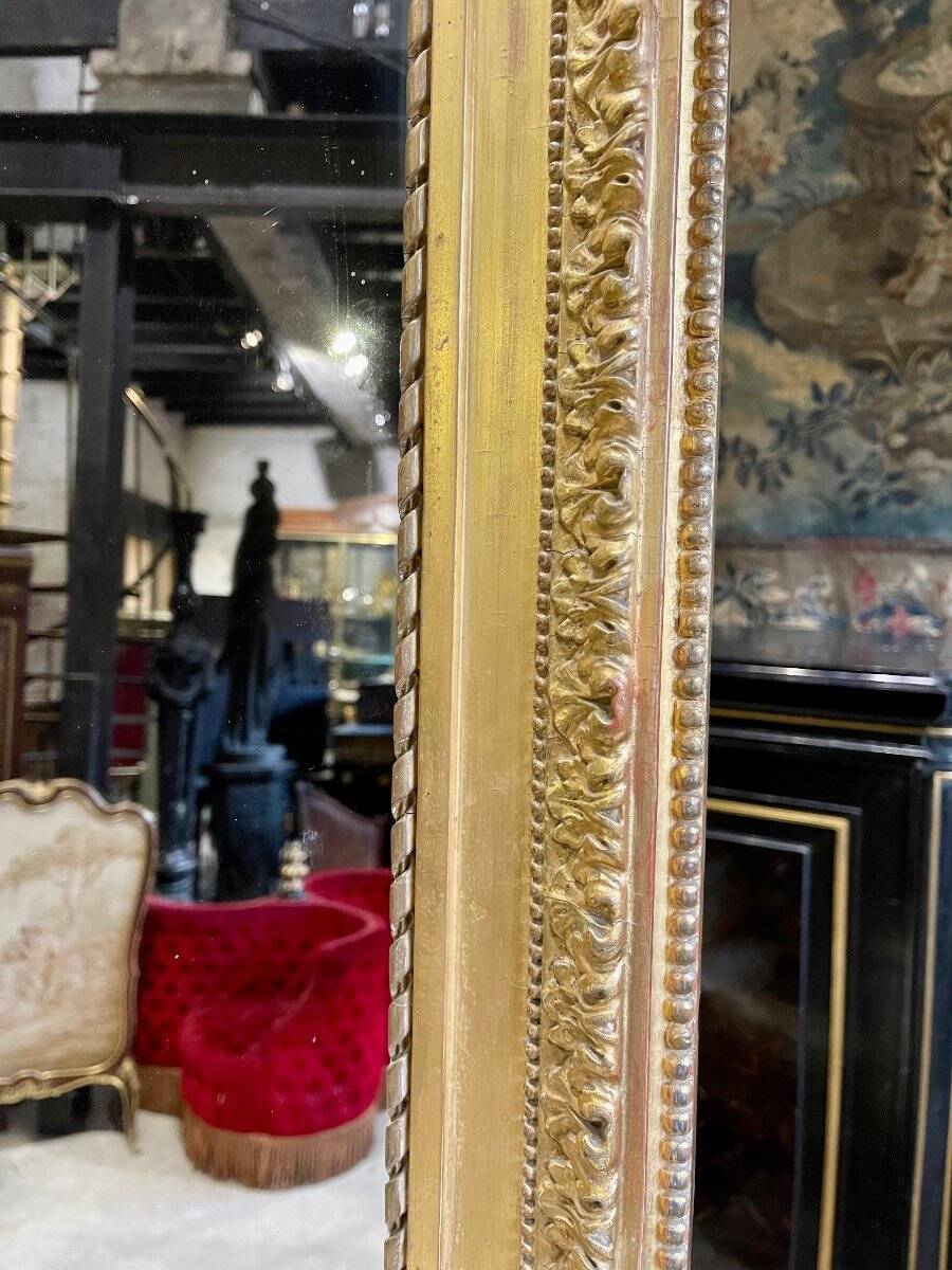 Louis XVI style gilded wood mirror from the Napoleonic III era, 2.75m x 1.48m.