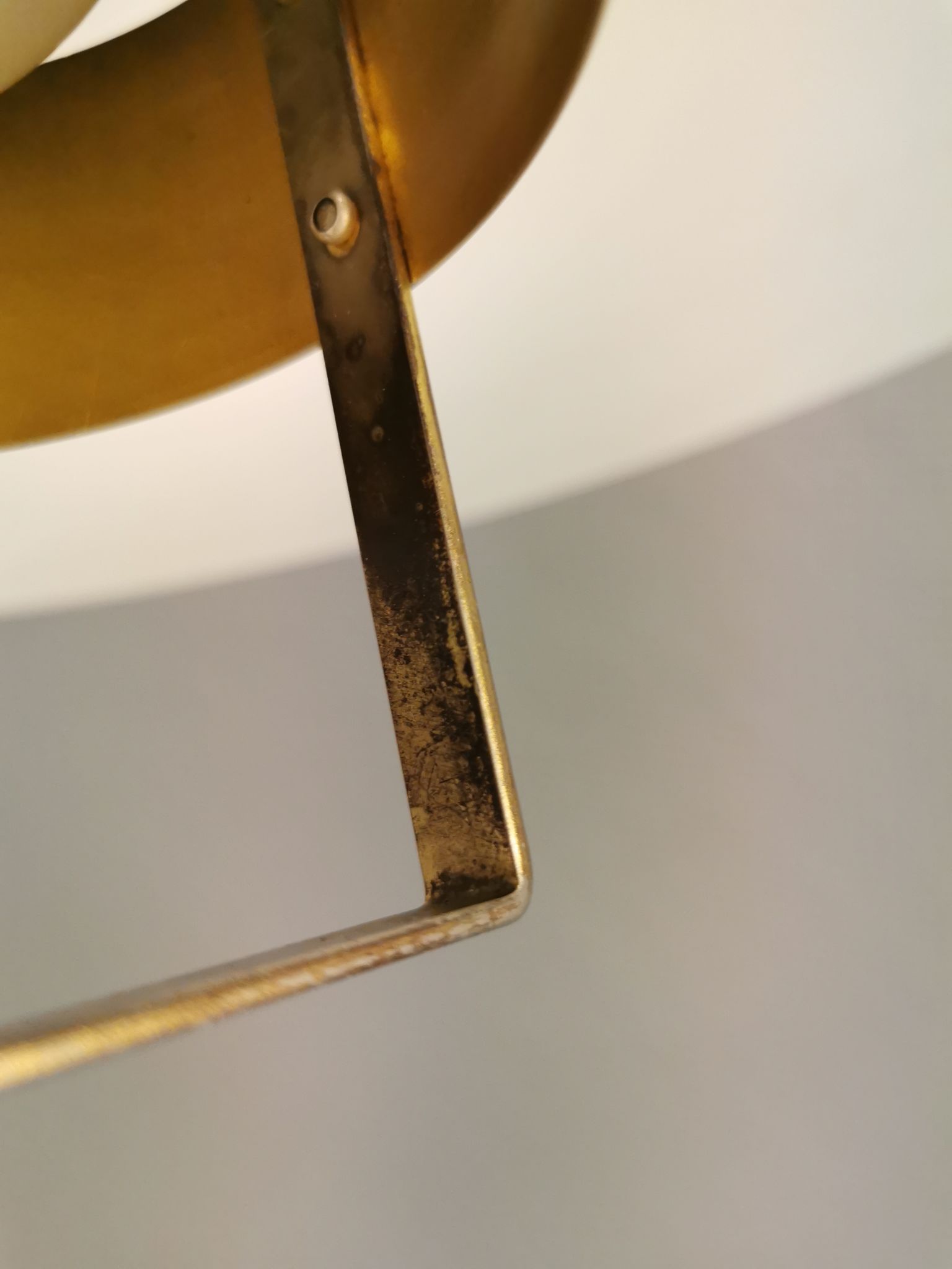 Hanging lamp from the 1970s-1980s, made of metal and brass.