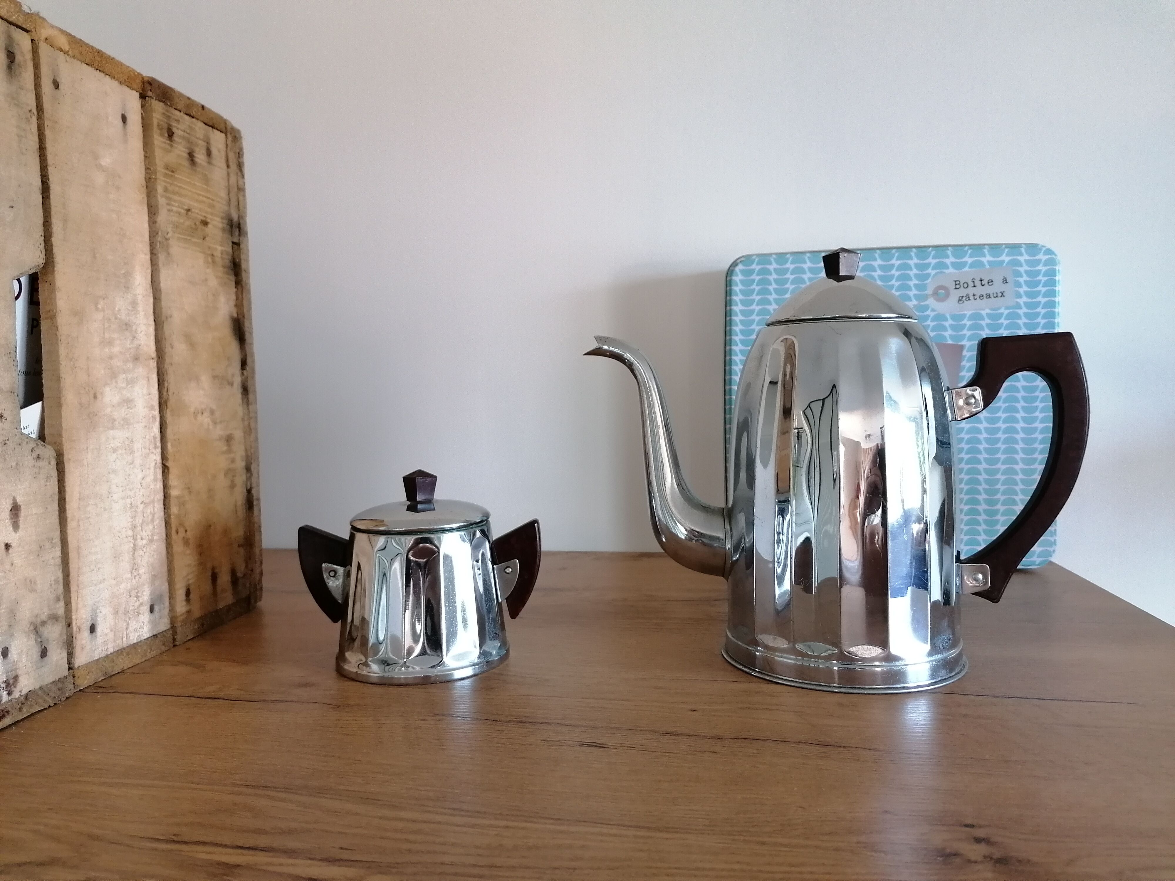old coffee maker and its stainless steel sugar bowl