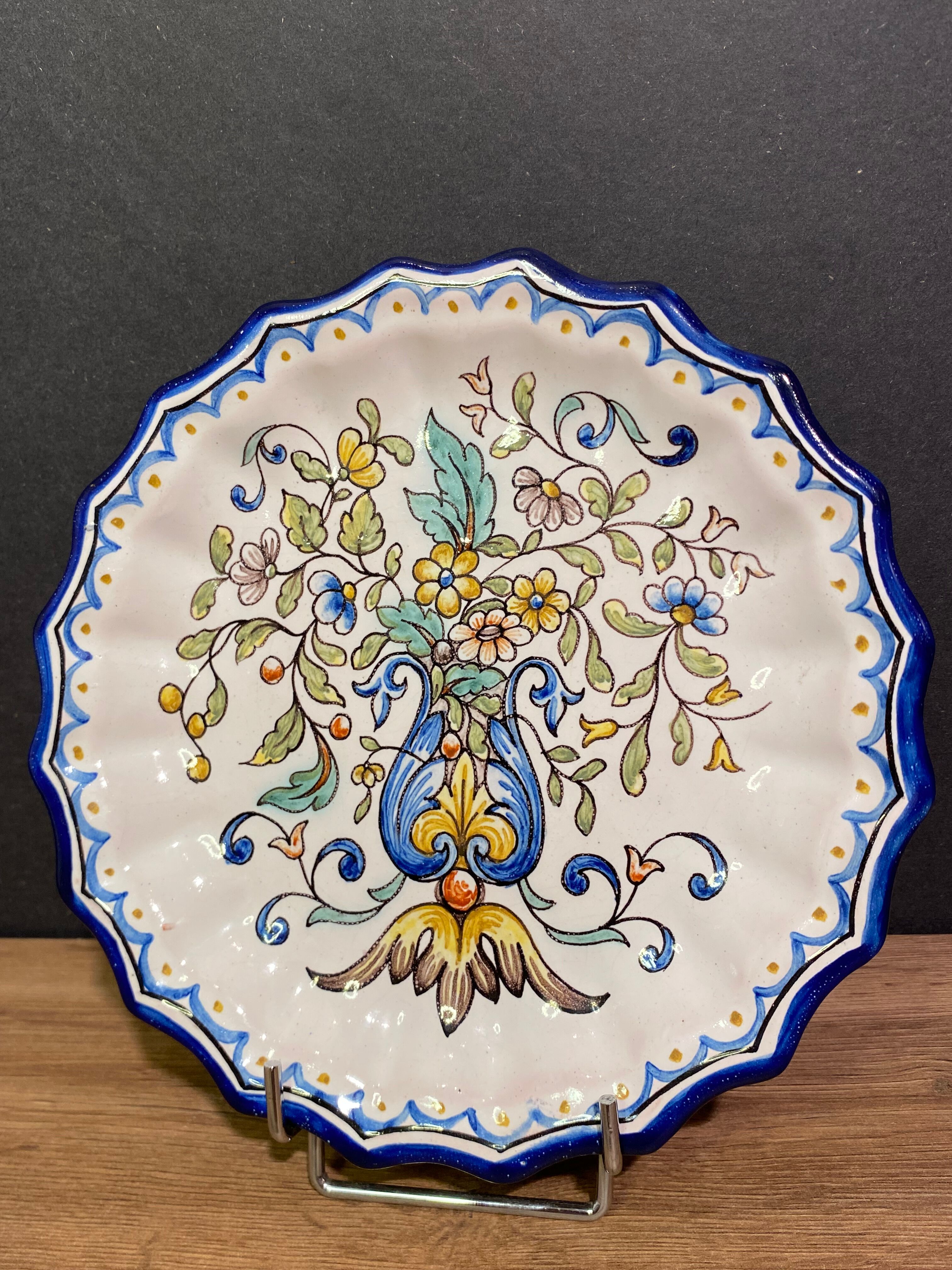 Pair of plates with floral decoration in Nevers earthenware signed Montagnon