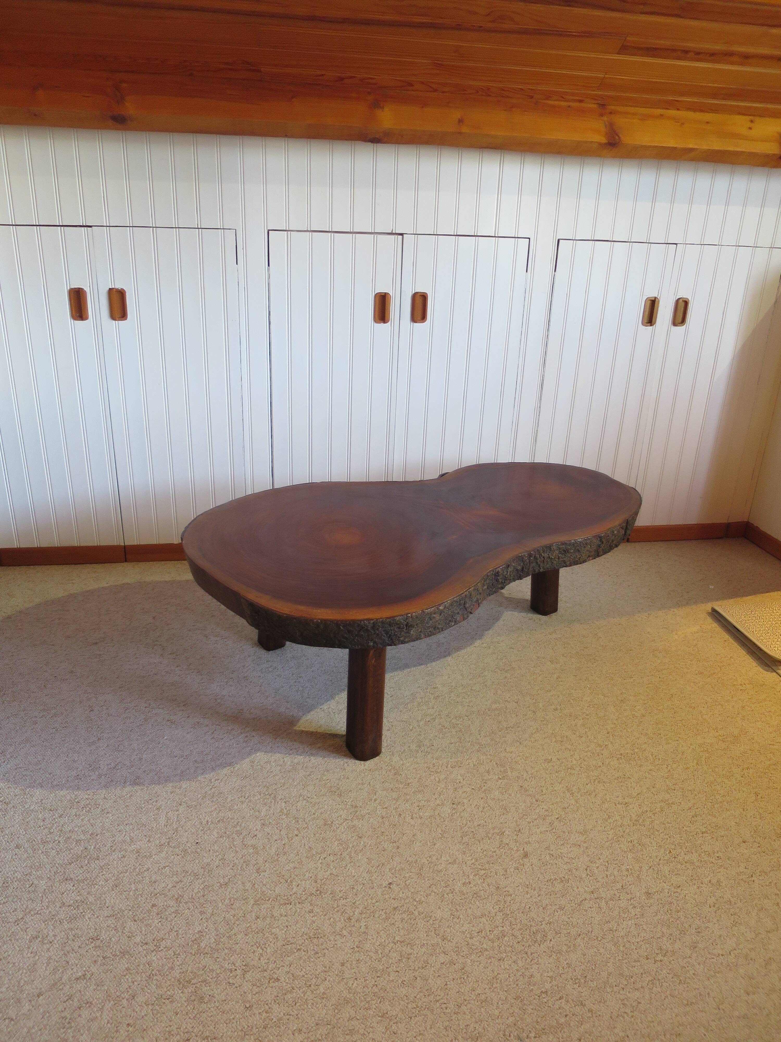 Tripod coffee table - solid okoumé wood - organic shape - brutalist style