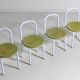 Set of four Italian postmodern metal chairs with sculpted seats, 1980s