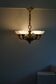A modern Danish Art Deco chandelier, glass and brass, 1940s.