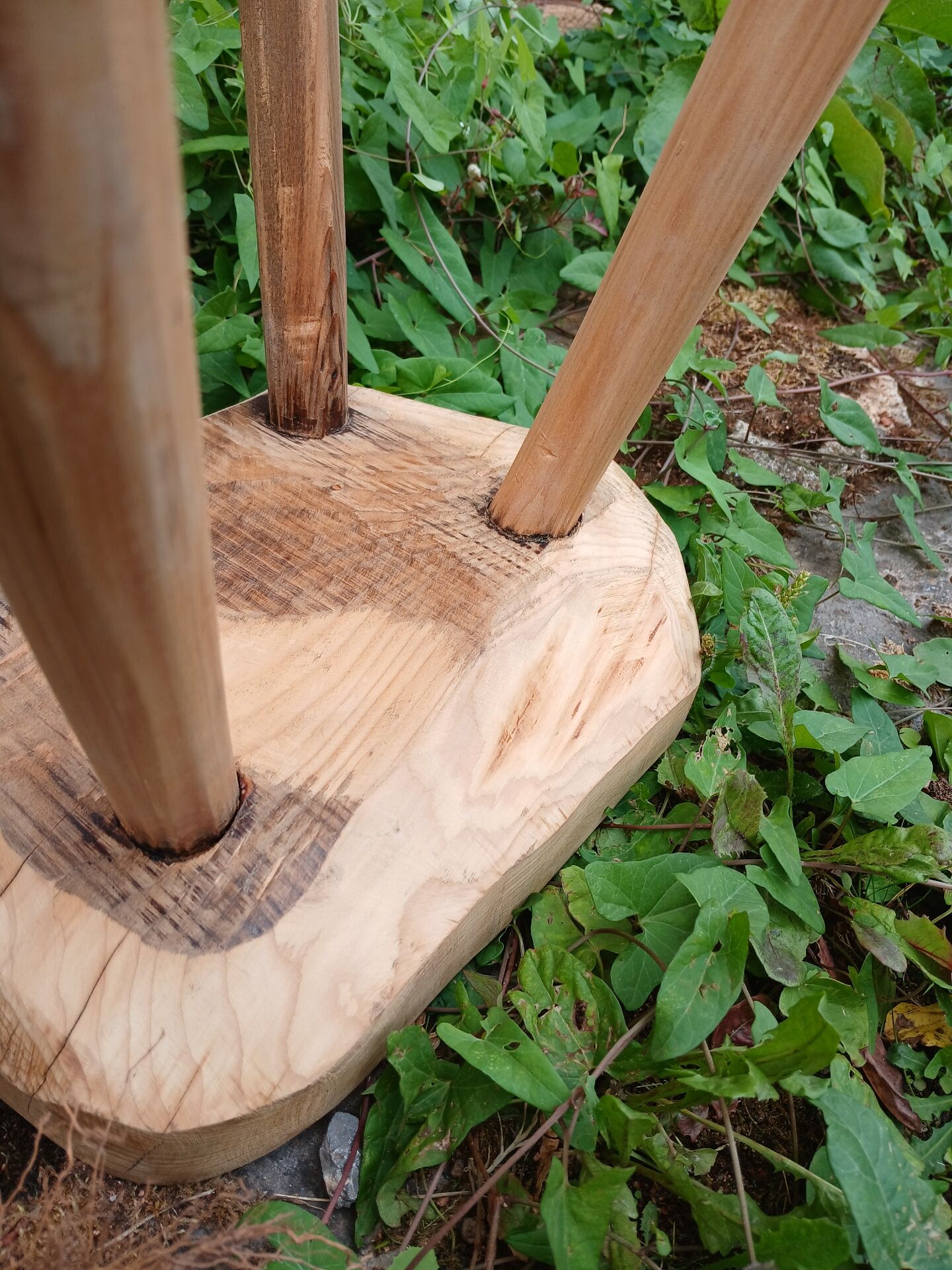 Antique stool in raw wood