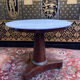 Mahogany pedestal table with marble top veneer