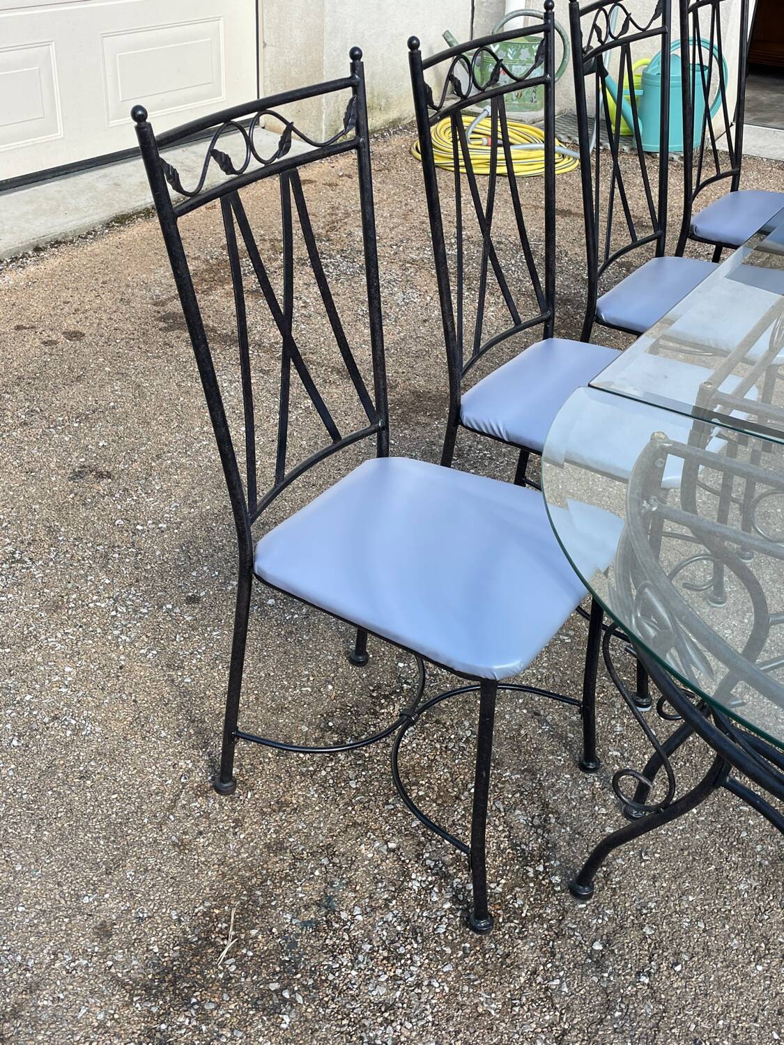 Glass and iron table with two side tables and 8 chairs