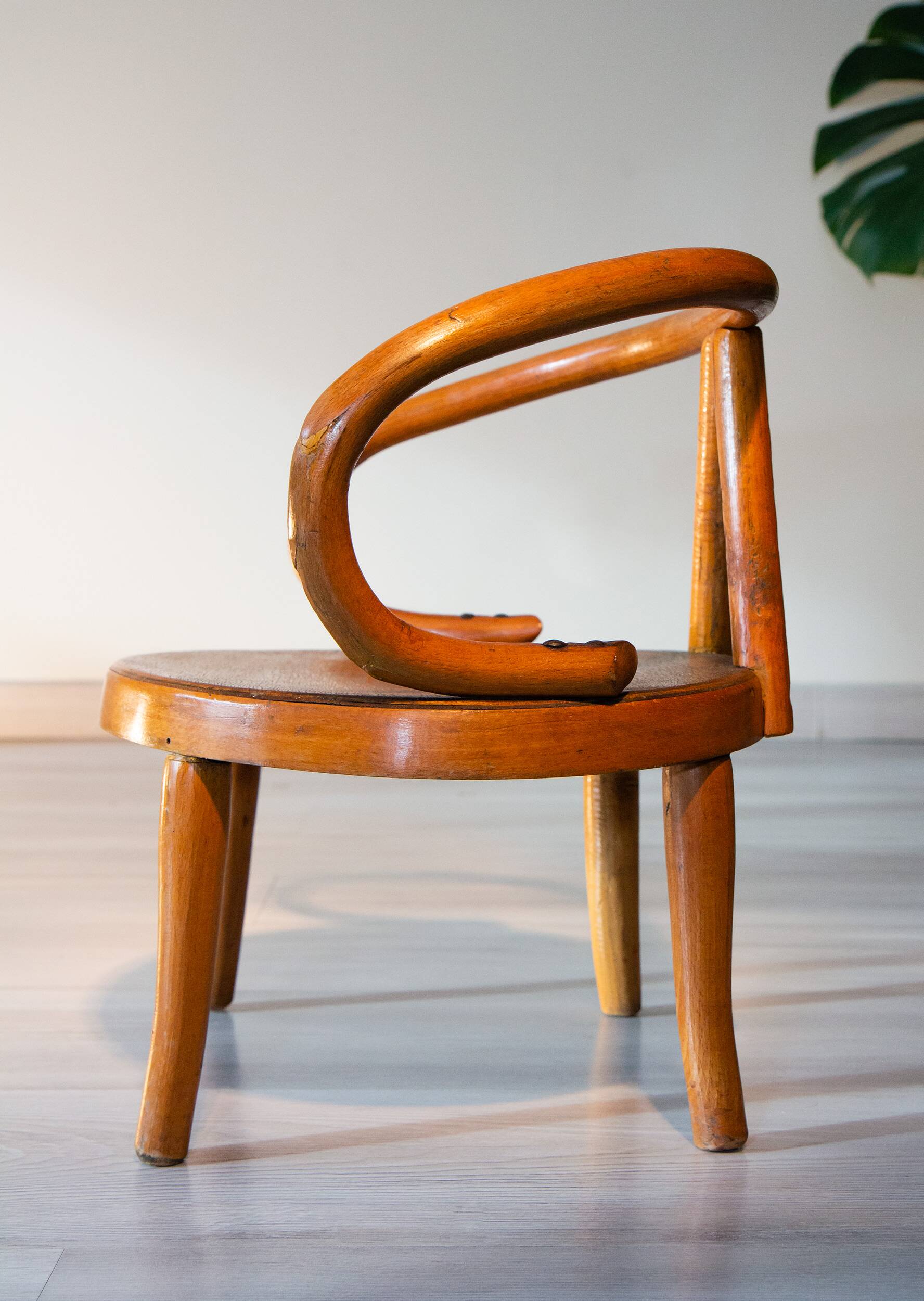 Le Corbusier style curved wood children's armchair, early 20th century