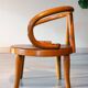 Le Corbusier style curved wood children's armchair, early 20th century