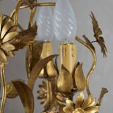 golden chandeliers with flowers.