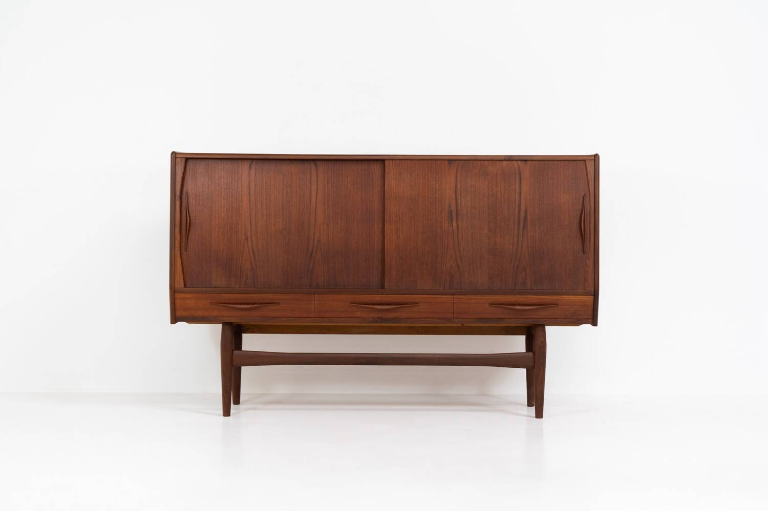 Teak highboard by Jensen & Mølholm (Denmark, 1960s).