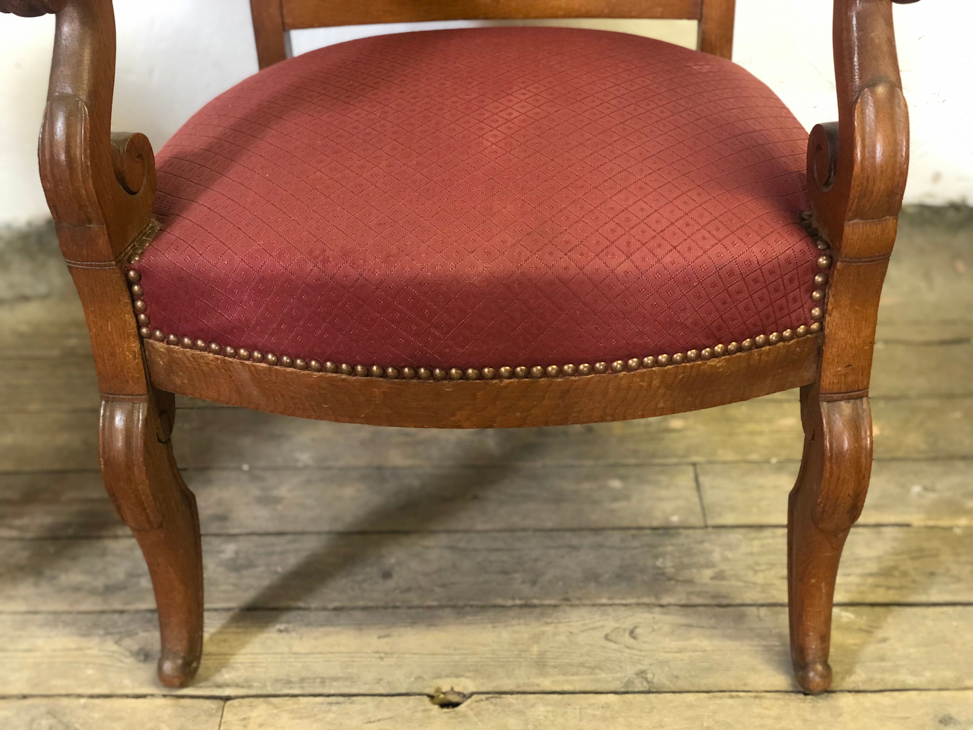 Louis Philippe era armchairs in burgundy-lined ground oak