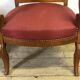 Louis Philippe era armchairs in burgundy-lined ground oak