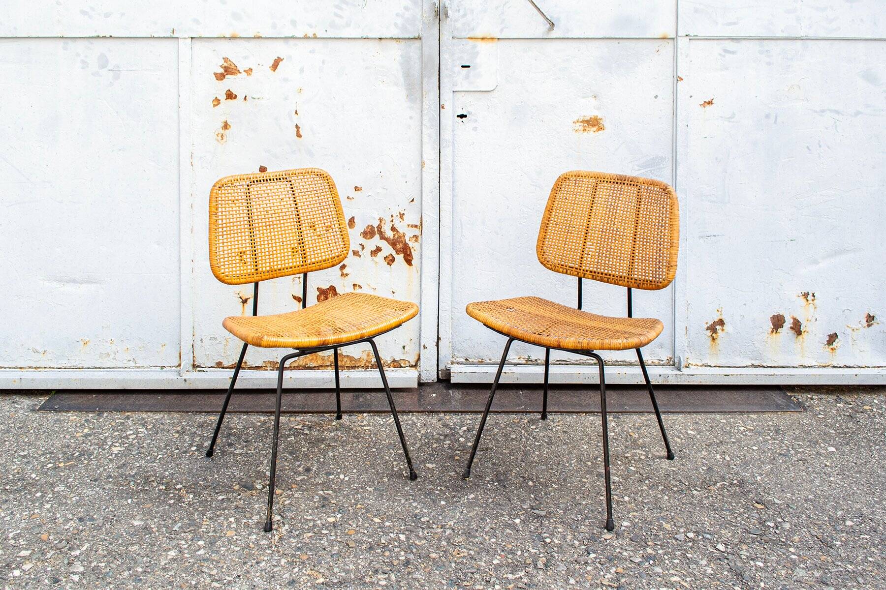 Dining chairs no. 550 in wicker by Dirk Van Sliedregt, Netherlands, 1950s, set of 2