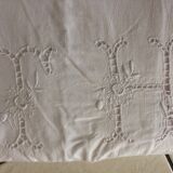 Old white sheet several rows of days lapel monogram