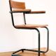 Desk with bauhaus style tubular steel chair