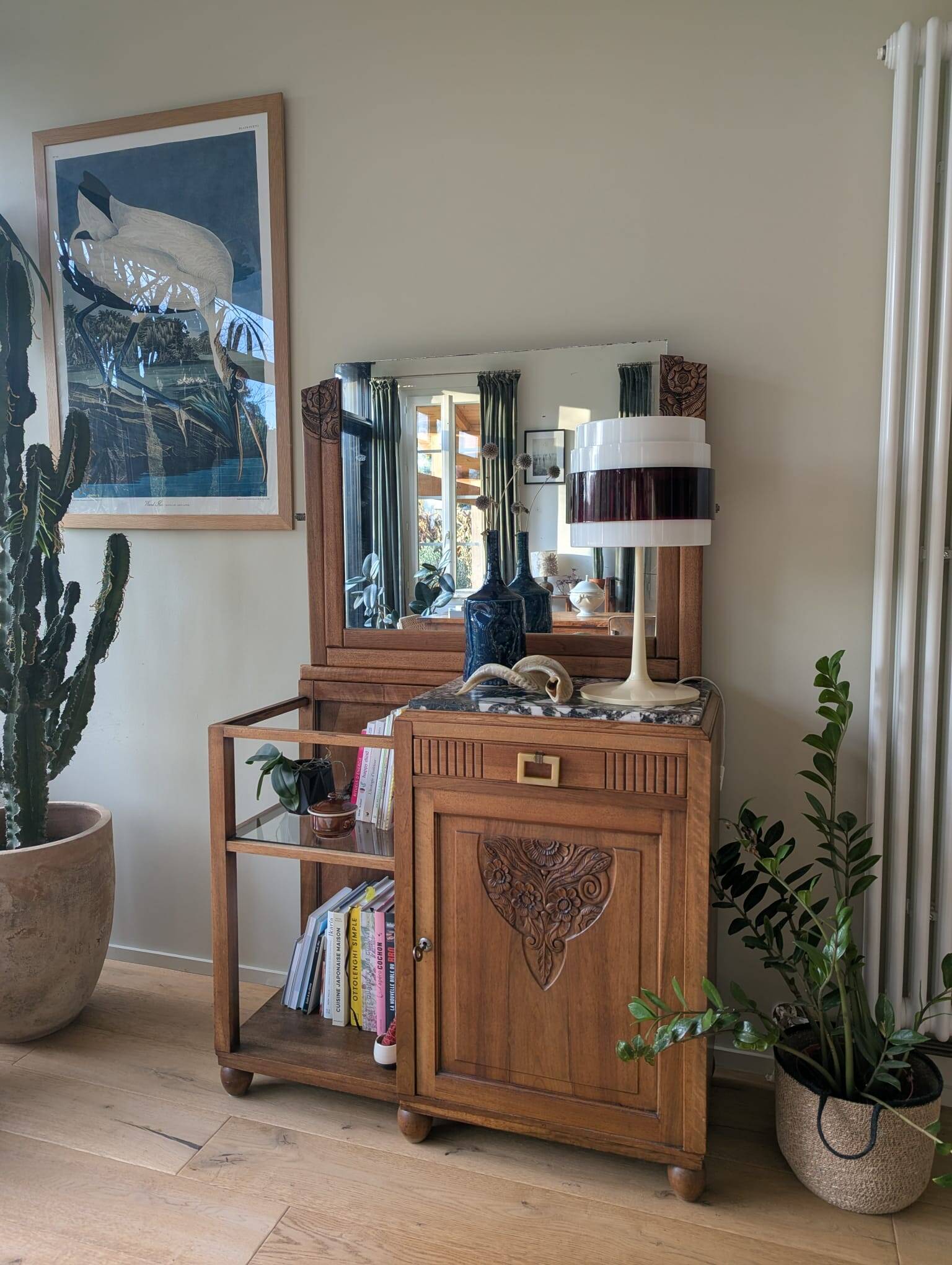 Art Deco wooden furniture with a swivelling mirror and marble top.