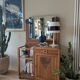 Art Deco wooden furniture with a swivelling mirror and marble top.