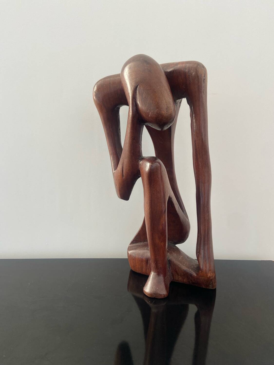 Wooden sculpture the Thinker