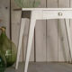 White compass feet table