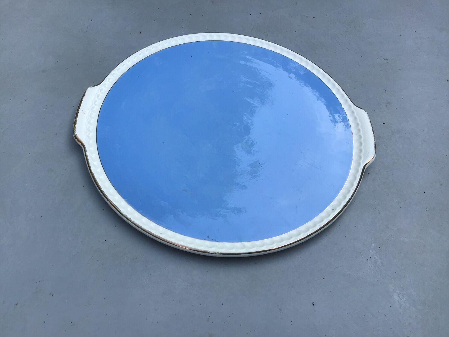 Large sky blue pie dish with gold edging