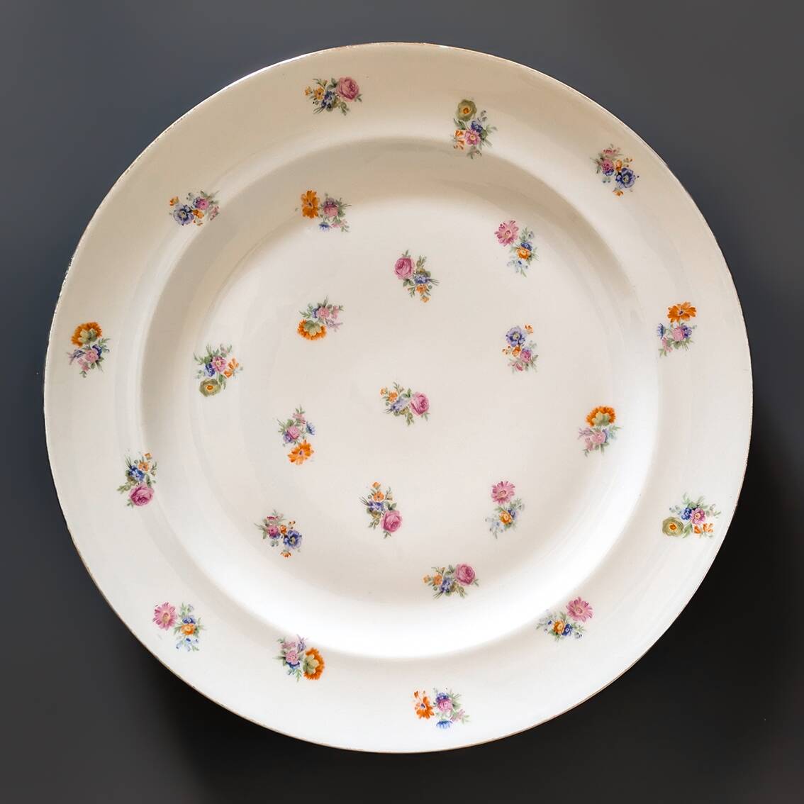 Plat rond porcelaine de Limoges Georges Boyer D28,5cm