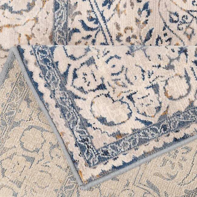 Blue, grey and beige oriental rug.