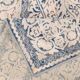 Blue, grey and beige oriental rug.