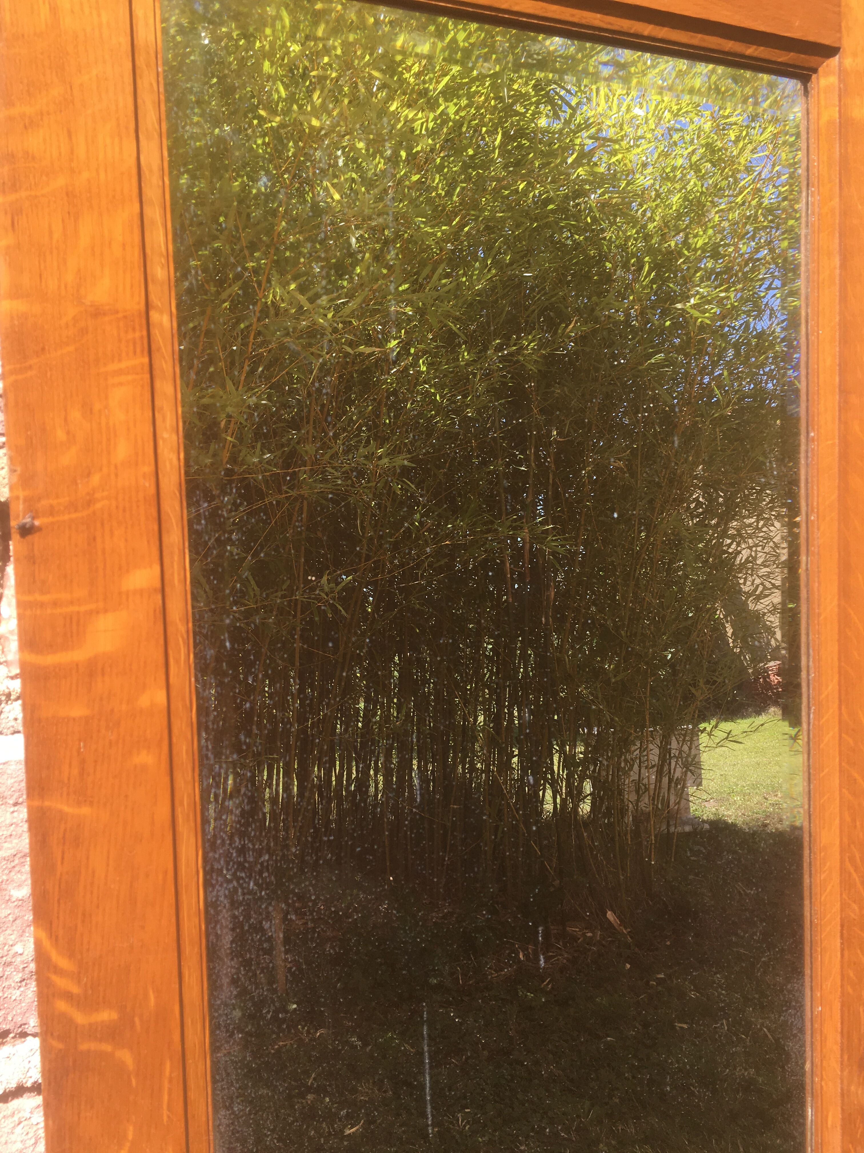 Bevelled mirror oak frame