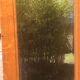 Bevelled mirror oak frame