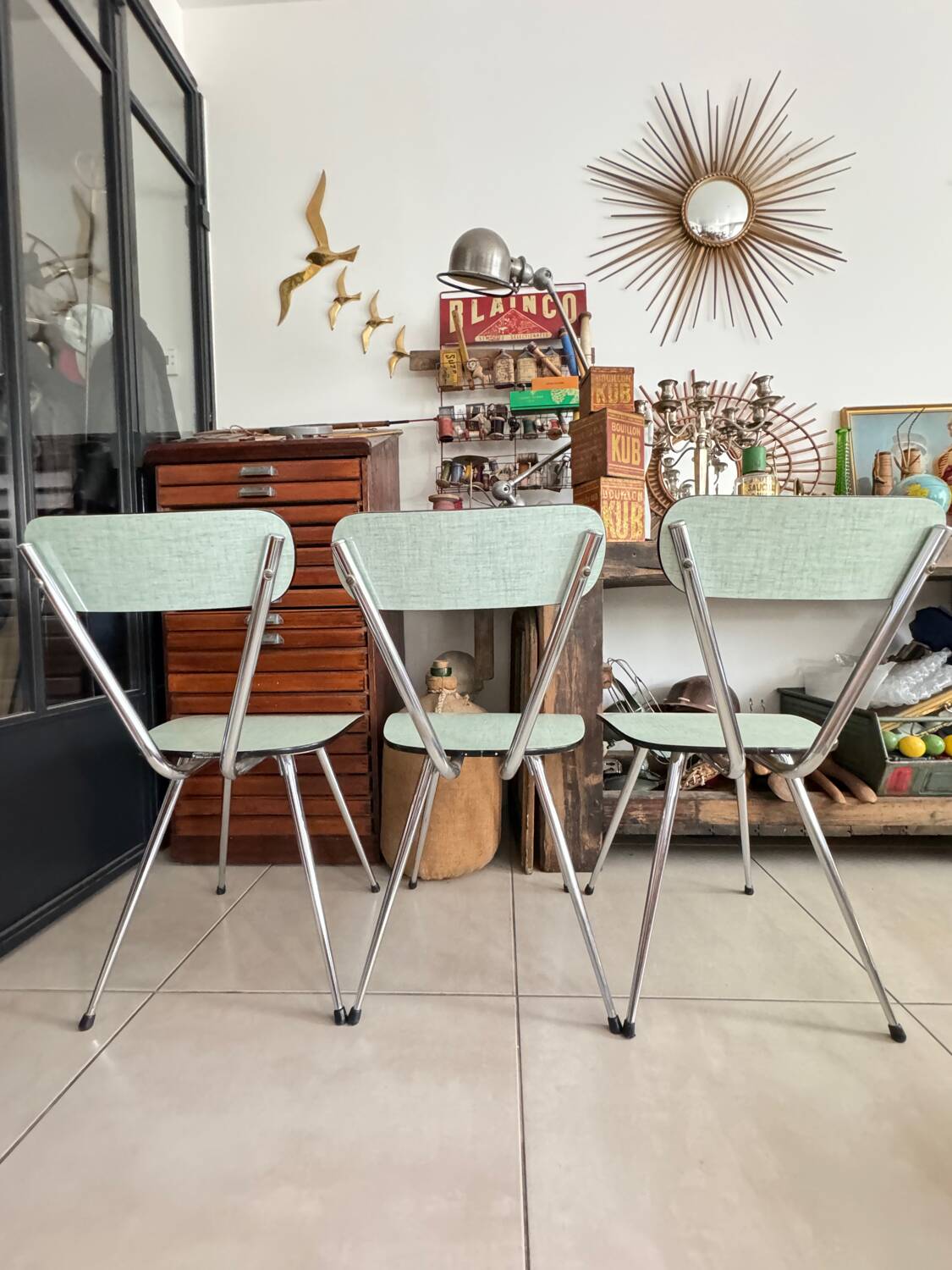 Set of 3 green Formica chairs