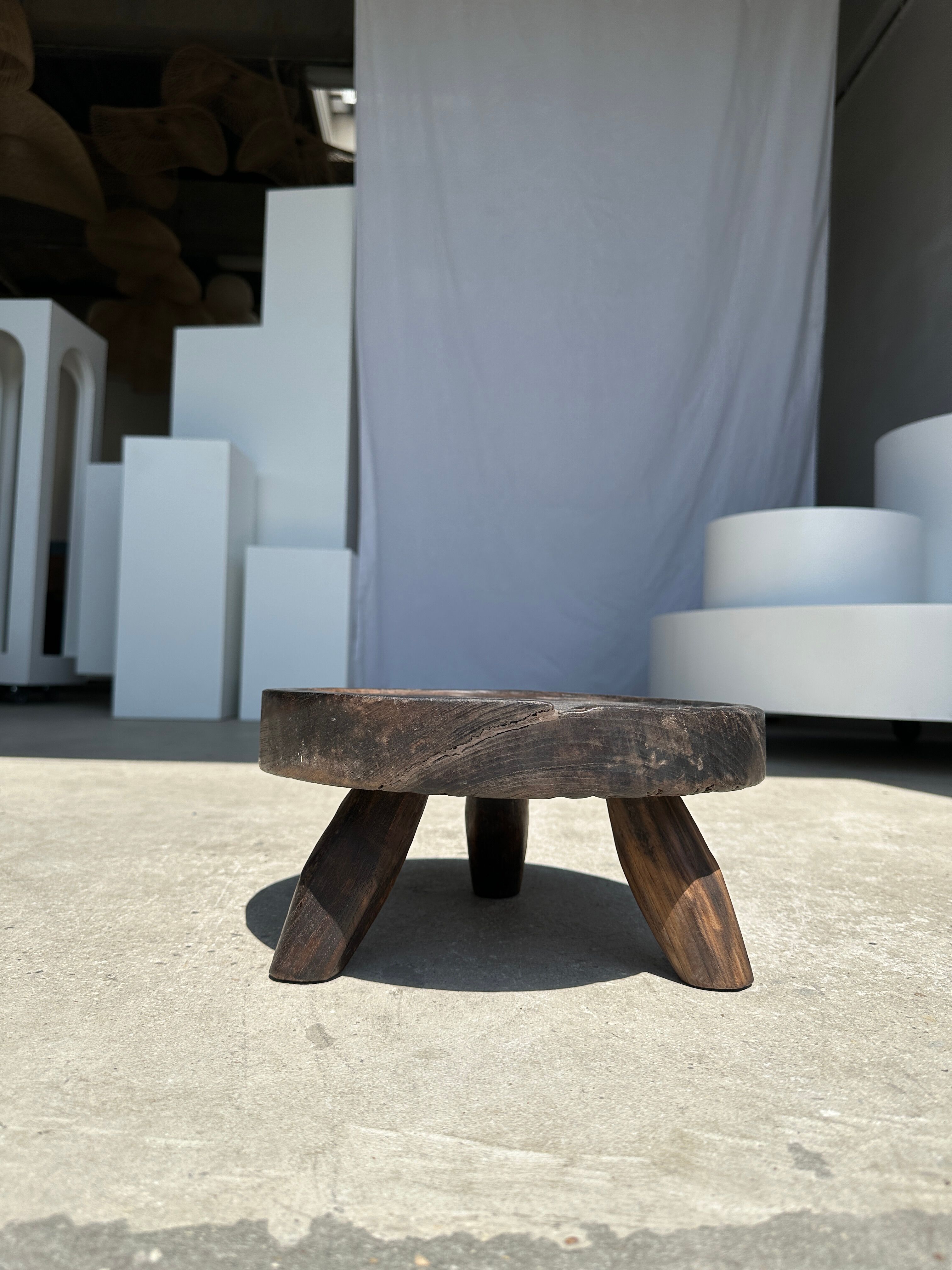 Small tripod stool low in dark brown upcycled teak
