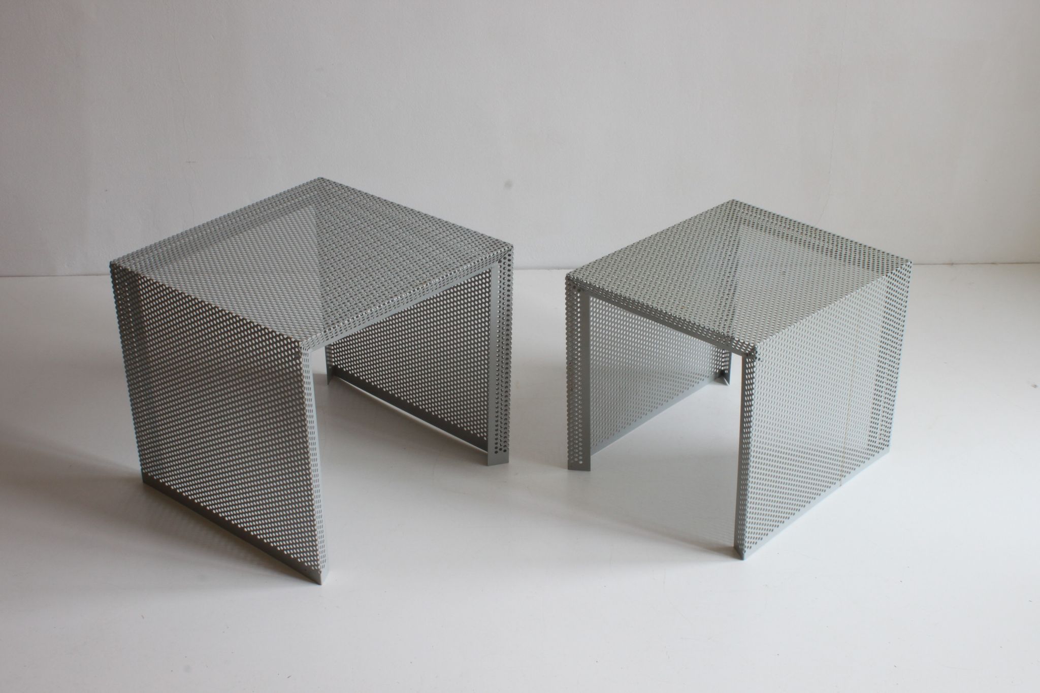 Grey perforated metal nesting side tables, 1990s set of two.