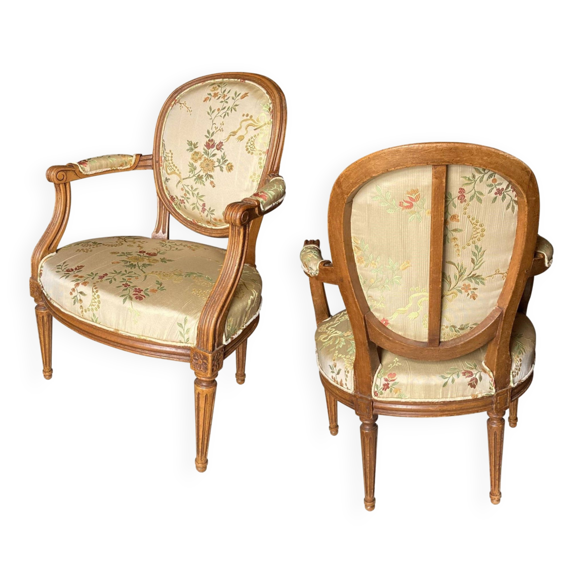 Pair of Louis XVI silk cabriolet armchairs