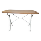 Bistro table with cast iron base and oak top