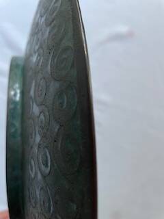 Enamelled metal centrepiece