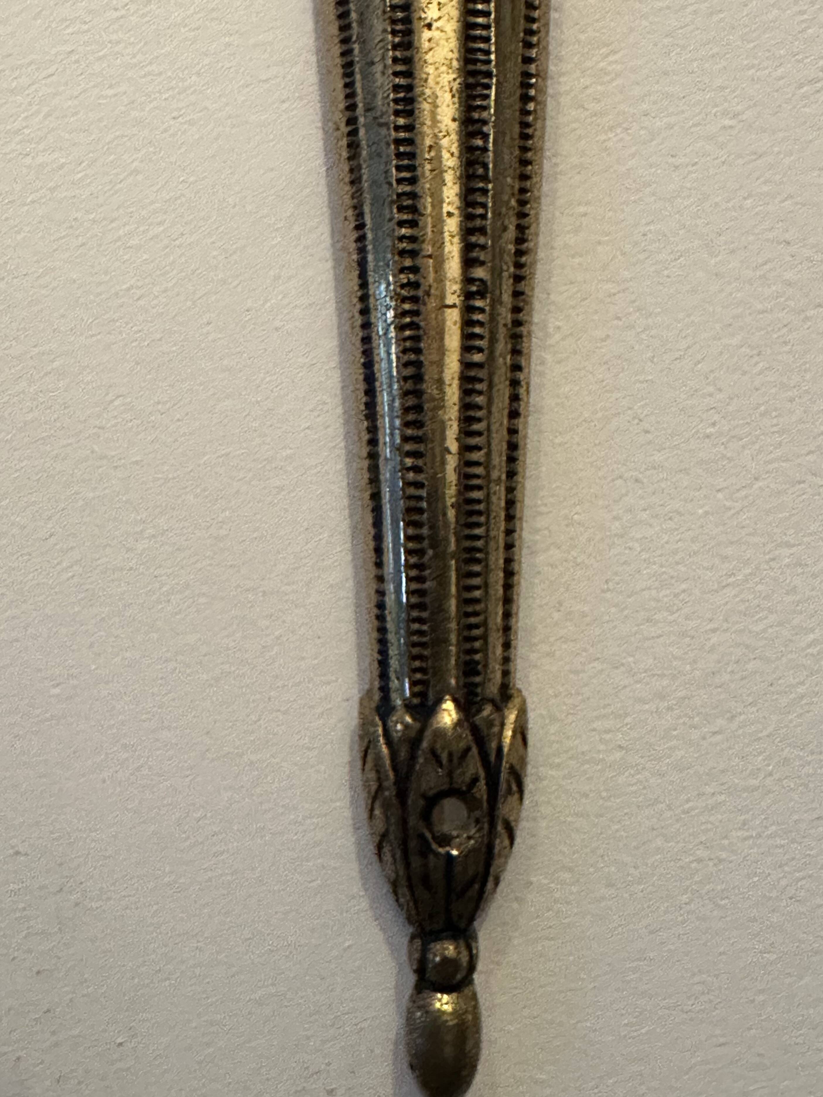 Pair of mid-19th century brass tassel sconces