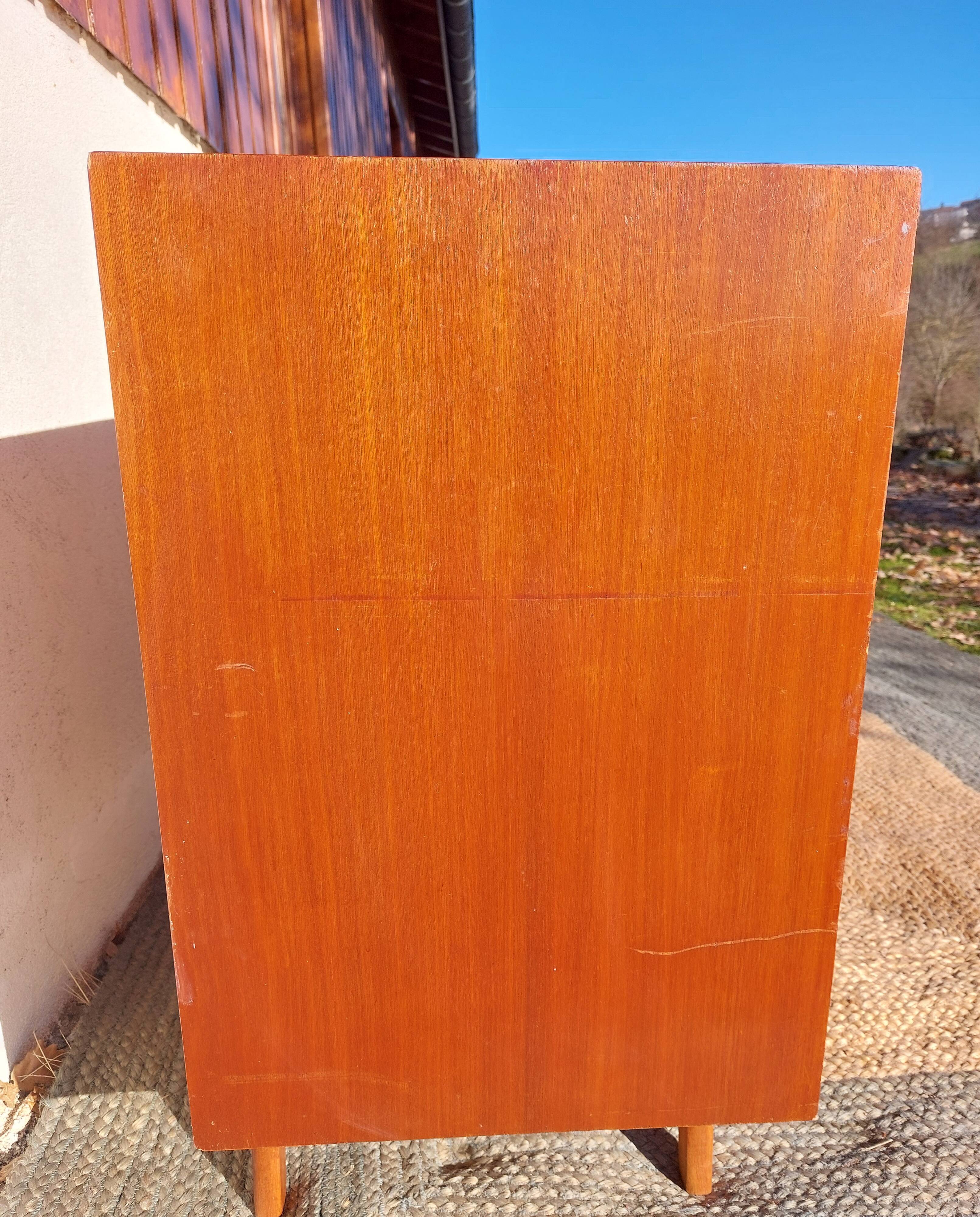 Vintage chest of drawers with tapered legs
