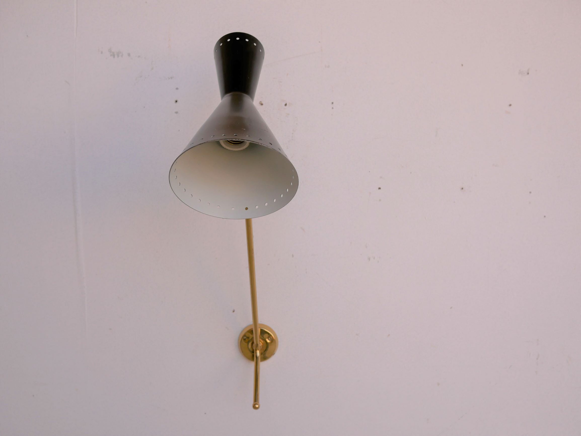 Vintage "Diabolo" wall apply in black metal and brass