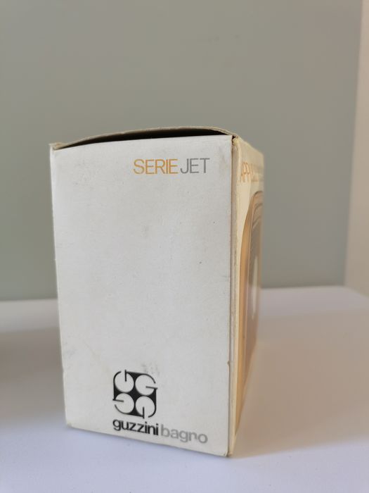 Guzzini sconce by Makio Nasuike