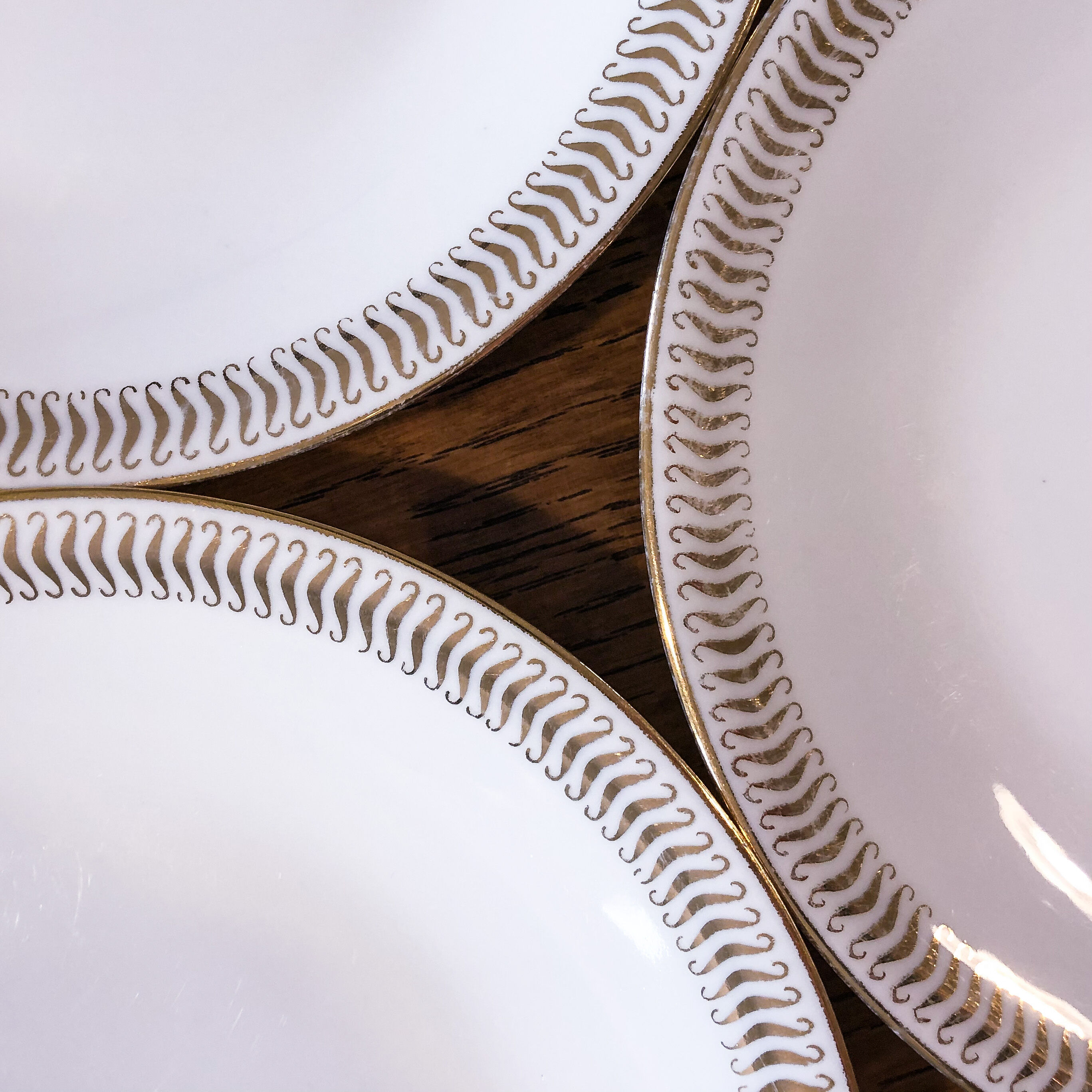 Set of 7 porcelain dessert plates from Limoges