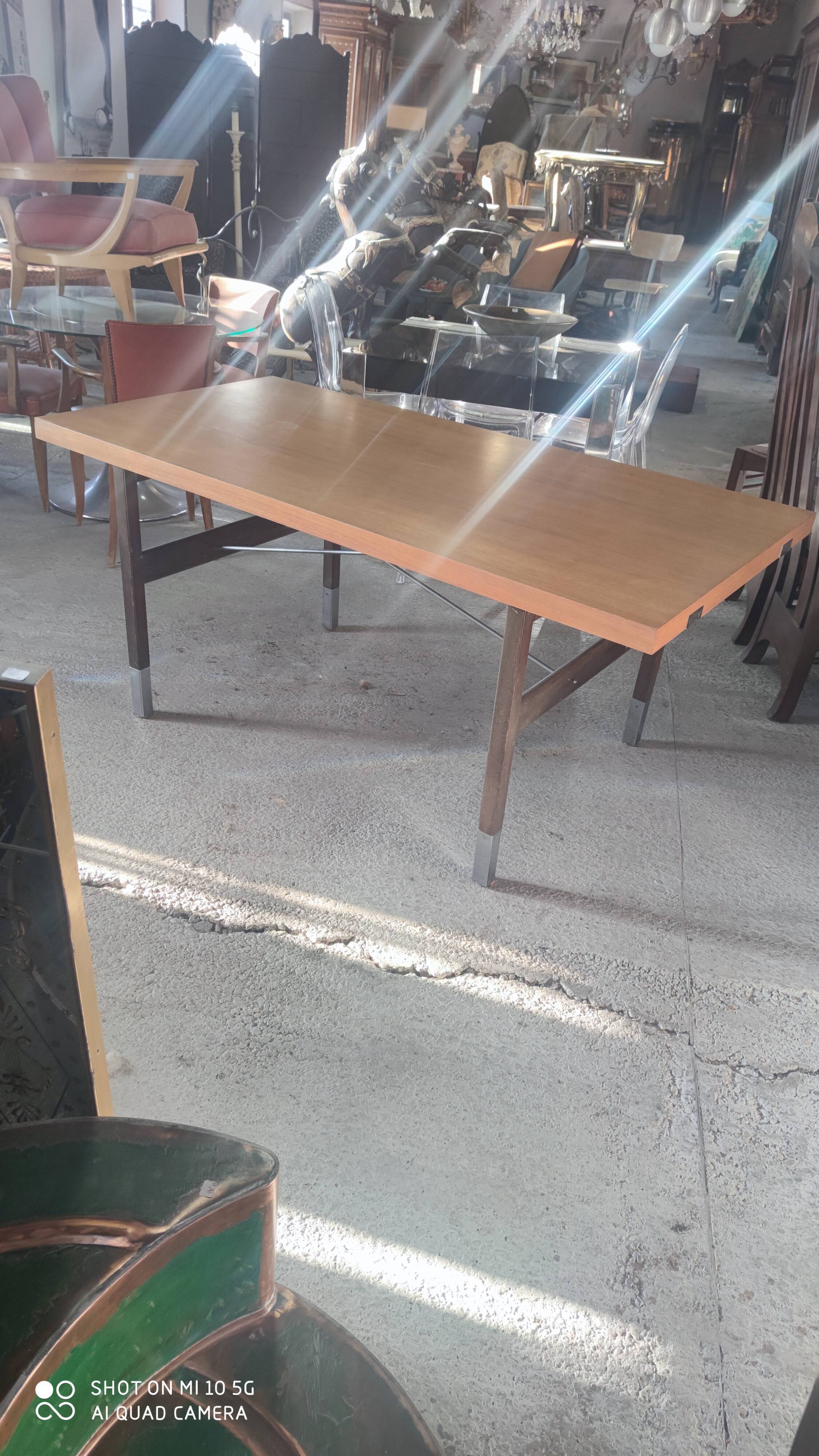 Extendable dining table in walnut, mahogany and chrome, circa 1960