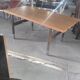 Extendable dining table in walnut, mahogany and chrome, circa 1960