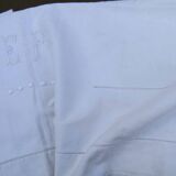 Old white sheet monogrammed E.P embroidered cotton