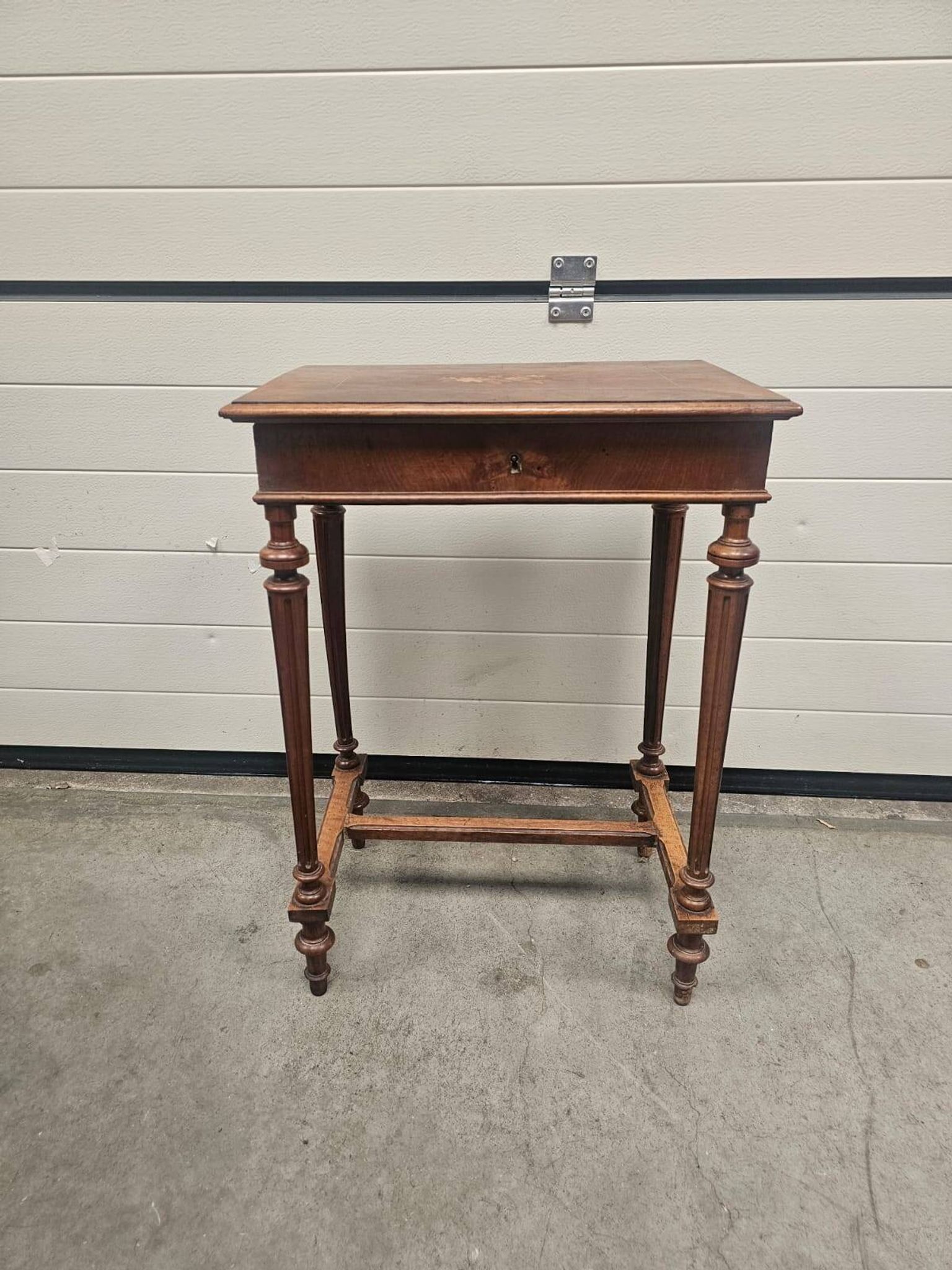Antique dressing table with floral marquetry and integrated mirror.