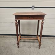 Antique dressing table with floral marquetry and integrated mirror.