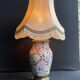 Old Asian vase mounted as a lamp with pagoda lampshade