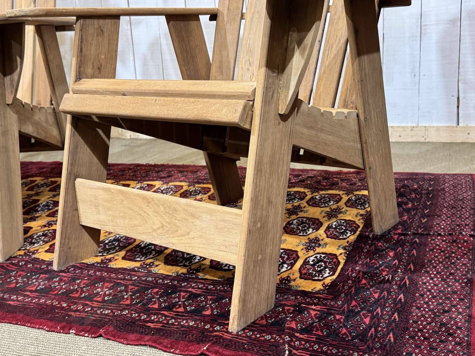 Pair of Indian teak armchairs
