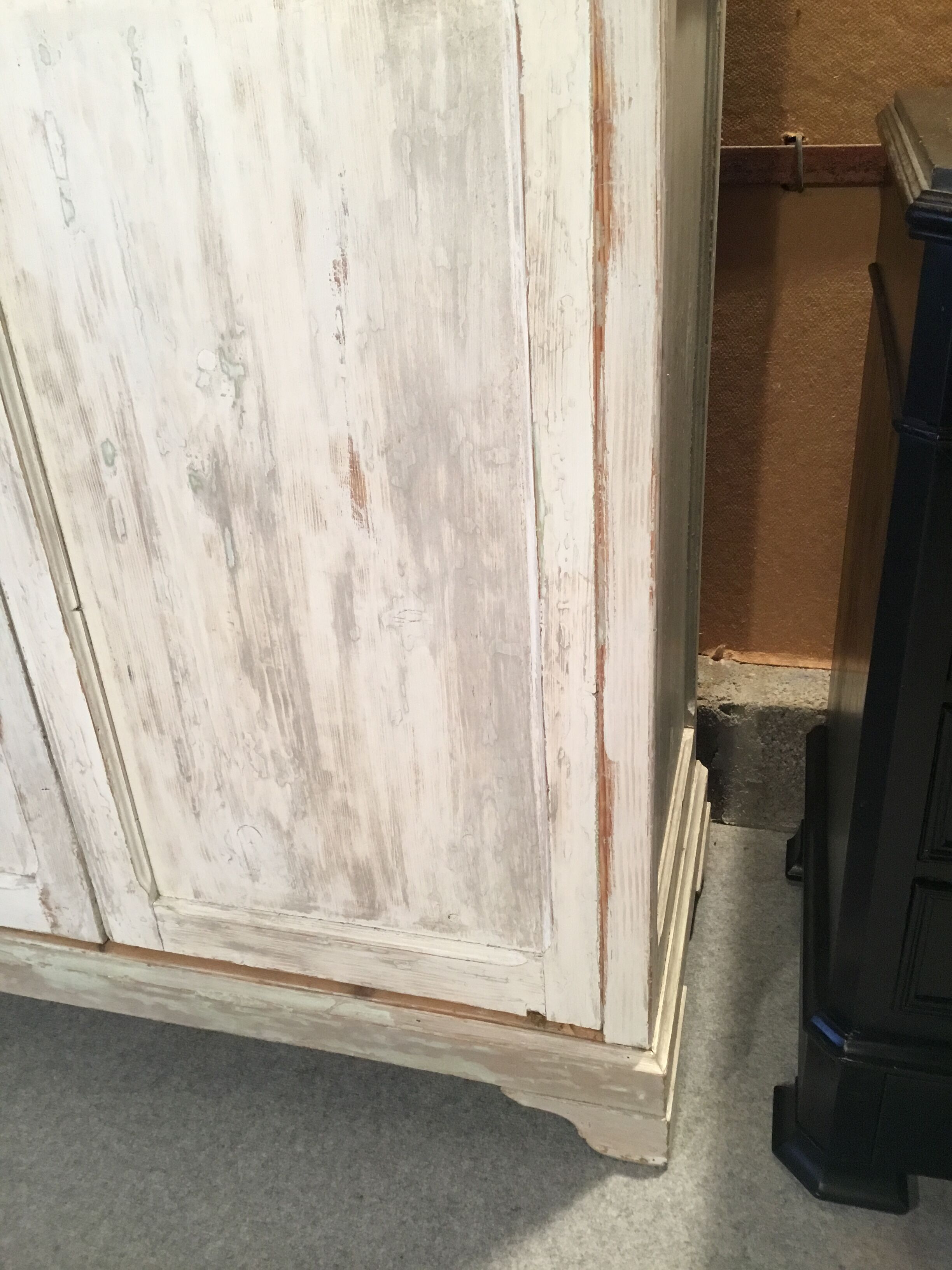 White patinated wardrobe