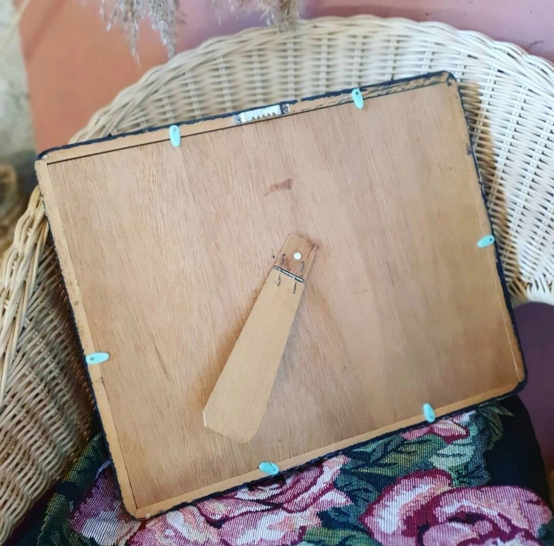 Black frame of stuffed butterflies