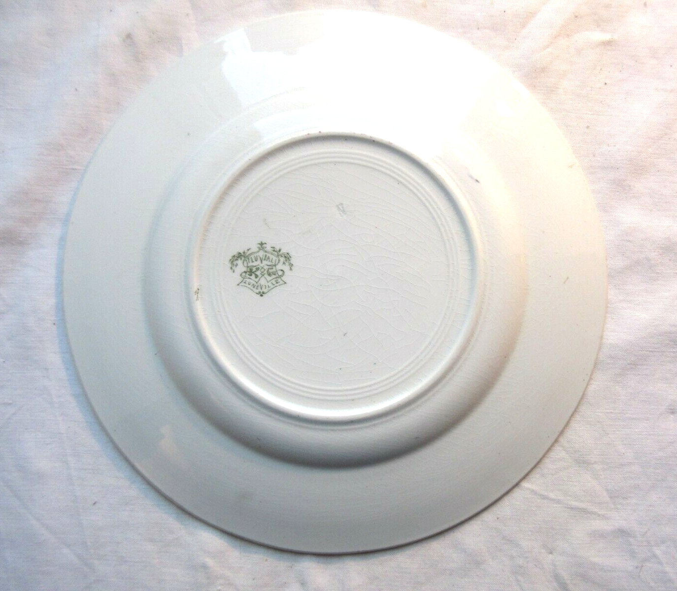 Flat art deco plate in Lunéville porcelain: fluvial model